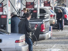 Alberta's carbon tax kicked in on Jan. 1 and some  Edmontonians lined up at the Costco gas pumps in advance to save that 4.5 cents one more time on December 31, 2016.  File photo.