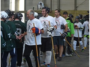 Oilers Alumni Team shake hands after facing off with the Special Olympics athletes (green) during the annual Floor Hockey Invitational tournament along with over 300 athletes from Alberta at the Expo Centre in Edmonton,November 25, 2017. Ed Kaiser/Postmedia
Ed Kaiser Ed Kaiser, Ed Kaiser/Postmedia