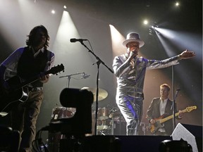 Gord Downie (middle) and The Tragically Hip perform in concert at Rexall Place in Edmonton on Thursday July 28, 2016. Fans across Canada complained when tickets to The Hip's last tour sold out in minutes - only to show up immediately after on StubHub.