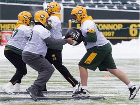 Edmonton Eskimos (left to right) Justin Sorensen and Matthew O'Donnell take part in a team practice at Commonwealth Stadium, in Edmonton Wednesday Nov. 8, 2017.