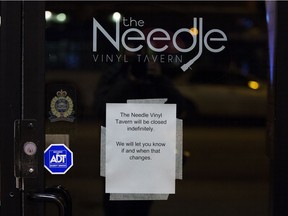 A sign on the front door Tuesday reads: "The Needle Vinyl Tavern will be closed indefinitely. We will let you know if and when that changes."