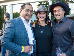 Richard Wong (left) at Pinot on the Patio fundraiser last summer with guests Sharon McLean and former Alberta Liberal leader Dr. Raj Sherman.