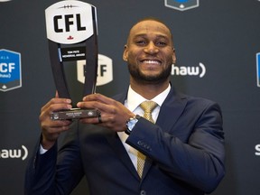 Edmonton Eskimos wide receiver Adarius Bowman, recipient of the Tom Pate Award, poses backstage at the CFL awards on Nov. 23, 2017