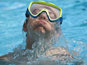 Darien McLeod uses the Fred Broadstock outdoor pool. Edmonton's outdoor pools will be free again this summer, city officials decided Wednesday.