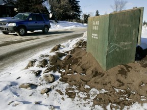 City of Edmonton supplied free sand boxes sit at the corner of 85 St. and Strathearn Drive. File photo.