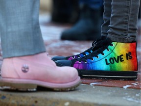 Rainbow flags and even shoes added colour to a rally in support of gay-straight alliances and Bill 24 at the McDougall Centre in Calgary on Sunday, Nov. 12, 2017.