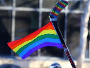 A rainbow flag and hockey stick added colour to a rally in support of gay straight alliances (GSA's) and Bill 24 at McDougall Centre in downtown Calgary on Nov. 12, 2017.