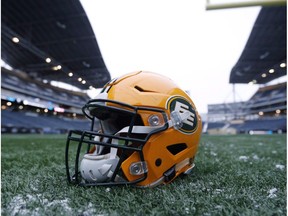 A helmet belonging to a Edmonton Eskimos player is seen on the field during a team practice session in Winnipeg on Wednesday, Nov. 25, 2015. Winnipeg Mayor Brian Bowman thinks the CFL Edmonton Eskimos should change their team name. "I think there's an opportunity to have a more inclusive name," he said. File photo.
