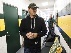 Edmonton Eskimos head coach Jason Maas walks to a press conference to speak about the year after being eliminated from the Western Finals by the Calgary Stampeders, in Edmonton, Alta., on Tuesday Nov. 21, 2017.