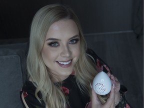 Ola Cislik is a University  of Alberta law student who has started GlamPod, a company that sells a portable ventilated carrying case for cosmetic sponges, shows her product in Edmonton on Nov. 22, 2017.