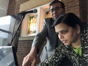 University of Alberta postdoctoral student Kalpana Singh, right, and Jammi Rao of the Credit Union Deposit Guarantee Corporation share their findings from the Data For Good Edmonton datathon on Sunday, Nov. 26, 2017. More than 100 data scientists shared their expertise on questions to help the not-for-profit sector.