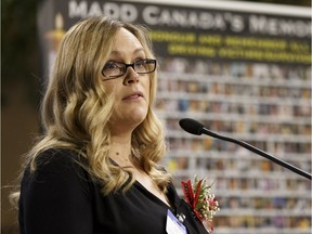 Allison Tatham, a MADD Edmonton volunteer, speaks about the loss of her father to impaired driving as MADD Edmonton's Red Ribbon Campaign launches at Edmonton Police Service Headquarters on Friday, Nov. 3, 2017.