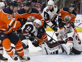 Edmonton's Patrick Maroon (19) is stopped by Arizona's goaltender Scott Wedgewood (31) during the second period of a NHL game between the Edmonton Oilers and the Arizona Coyotes in Edmonton, Alberta on Tuesday, November 28, 2017.