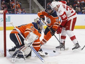 Detroit Red Wings Anthony Mantha (39) scores a goal on Edmonton Oilers goalie Cam Talbot (33) as Darnell Nurse (25) defends during third period NHL action in Edmonton, Alta., on Sunday, November 5, 2017.