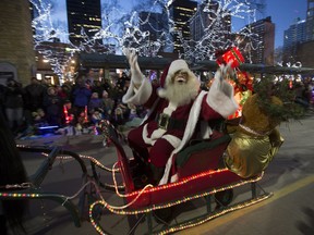 Santa sings to the crowd during Santa's Parade of Lights on Nov. 21, 2015, in Edmonton. A decision was made in March to pull the plug on the parade for 2019.