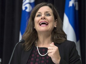 Quebec Justice Minister Stephanie Vallee provides further details about how the government's controversial Bill 62 will be implemented at the legislature in Quebec City Tuesday, Oct. 24, 2017. The law bans people from giving or receiving public services if their face is covered.