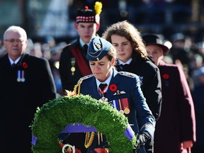 Governor General Julie Payette places a wreath during Remembrance Day ceremonies at the National War Memorial in Ottawa on Saturday, Nov. 11, 2017.