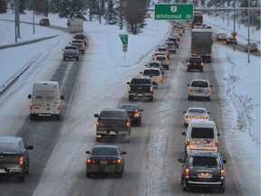 Traffic moves along Whitemud Drive near 53 Avenue in Edmonton on Dec. 2, 2013.