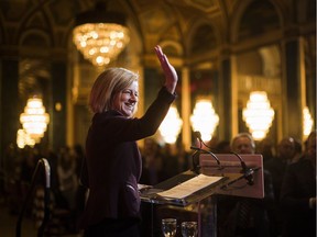 Premier Rachel Notley waves before speaking at a business luncheon put on by the Empire Club of Canada in Toronto, Monday, Nov. 20, 2017.