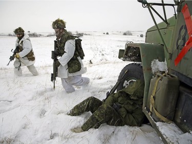 Soldiers participate in Exercise IRON RAM, a Canadian army field exercise of a simulated attack at Canadian Forces Base/Area Support Unit Wainwright on Friday Nov. 3, 2017.