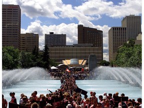 19 Jul 2001: The Canadian triathlon team makes their entrance to the opening ceremonies of the ITU World Triathlon Championships right through the reflecting pool in front of City Hall in Edmonton, Alberta, Canada. DIGITAL IMAGE Mandatory Credit: Brian Bahr/ALLSPORT