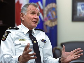 Police Chief Rod Knecht speaks during an end-of-year feature in his office at police headquarters in Edmonton, Dec. 19, 2017.