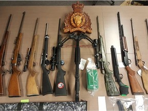 Law enforcement agencies, including the RCMP, seized firearms and drugs in a series of raids on residences in Cold Lake this month.