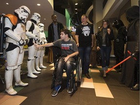 Addison Kenneth receives an Imperial escort as he arrives with his family, right, to the Jedi Addison's Dreams and Wishes event at the Scotiabank Theatre in Edmonton on Friday Dec. 15, 2017. The event included a special fundraising screening of Star Wars: The Last Jedi in support of Make-A-Wish Northern Alberta and the Children's Wish Foundation.
