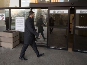 Derek Fildebrandt arrives at the law courts in Edmonton on Monday, Dec. 18, 2017. A former neighbour has accused Fildebrandt of a hit-and-run that damaged her van in June 2016.