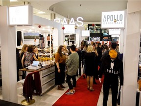 Shoppers check out Edmonton vendors during the RAAS Market's holiday Sip and Shop event in West Edmonton Mall.