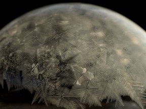 A macro photo of a soap bubble as it begins to freeze at -25 in Edmonton Friday, Dec. 29, 2017.