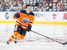 In this Oct. 4 file photo, Edmonton Oilers forward Kailer Yamamoto warms up for a game against the Calgary Flames.