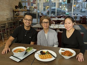 Restauranteurs Calvin Do, left, Lieu Nguyen and Thao Lam at An Chay, a family-owned Vietnamese vegetarian restaurant at 11203 Jasper Ave. in downtown Edmonton that opened in October 2017.