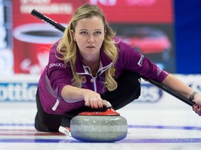 Skip Chelsea Carey throws a rock during Olympic curling trials action against Team Jones on Dec. 6, 2017