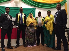 Abdirahman Ahmed, left, Abdiamin Hassa, Saada Abdar, Mohamed Bakal, Fozia Haibe and Said Tahar celebrate Somaliland's recent presidential election at the Portuguese Cultural Centre at 12964 52 St. in Edmonton on Saturday, Dec. 2, 2017.