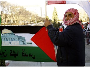 Mohammad Saleh joined the Canada Palestine Cultural Association at their Hands off Jerusalem protest at the Alberta legislature on Sunday, Dec. 10, 2017.