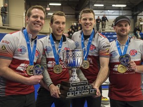 From left, Karrick Martin, skip Brendan Bottcher, Brad Thiessen and Darren Moulding celebrate after winning the 2017 Alberta Boston Pizza Cup men's curling championship in Westlock Feb. 12, 2017.