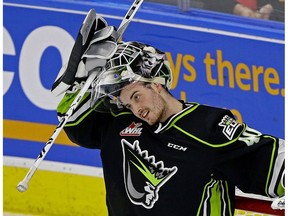 Edmonton Oil Kings goalie Travis Child takes a break during WHL game action against the Swift Current Broncos in Edmonton on Sunday, Dec. 10, 2017. He had a rough night as the Broncos scored six goals on him on the way to a 6-1 win.