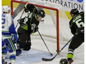 Edmonton Oil Kings teammates Brett Kemp and Wyatt McLeod could not score on this open net against the Swift Current Broncos in Edmonton on Sunday, Dec. 10, 2017.