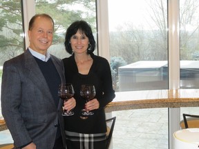 Retired surgeon Dennis Modry and wife Lana in their riverbank home they still hope to redevelop for a 45-unit luxury condo project.