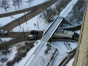 A semi-truck was stuck beneath a High Level Bridge overpass on Thursday, Dec. 28, 2017.