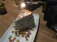 Try the Confetti Cake at Rebel restaurant.