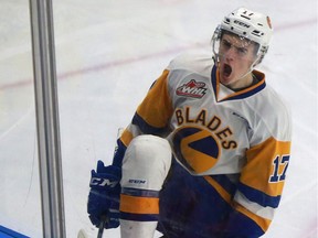 Saskatoon Blades' Eric Florchuk celebrates his game-tying goal against Moose Jaw Warriors during third-period action at SaskTel Centre in Saskatoon on January 21, 2018.