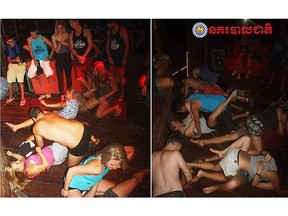 In this photo dated Jan. 25, 2018, issued by Cambodian National Police, a group of unidentified foreigners, who are accused of "dancing pornographically" at a party in Siem Reap town, near the country's famed Angkor Wat temple complex. Police said Sunday Jan. 28, 2018, they raided a rented villa on Thursday and found people "dancing pornographically", and while almost 90 foreigners were detained, all but 10 were released. Five British nationals, two Canadians, one Norwegian, one New Zealander and one from the Netherlands are being held.(Cambodian National Police via AP) ORG XMIT: PHM102