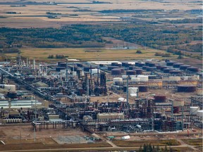 An aerial view of the Shell Scotford refinery, upgrader and chemical plant in Alberta's Industrial Heartland, just north of Fort Saskatchewan, Alta. on October 4, 2013. According to the Industrial Heartland Association the refinery manufactures gasoline, diesel, and jet fuel. The chemical plant produces styrene monomer used to manufacture plastics and ethylene glycol used for fleece or jackets. The upgrader processes bitumen from Shell's Muskeg River oilsands mine north of Fort McMurray. The industrial heartland is Canada's largest hydrocarbon processing centre. 75% of all motor fuel used in western Canada comes from this region. Dozens of oil refineries, chemical manufactures and fertilizer plants are all fed from Alberta's various oilsands, conventional oil and natural gas companies in northern Alberta.