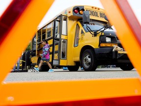 School children take part in the 12th annual First Riders event at Northlands, in Edmonton Thursday Aug. 31, 2017. The First Riders program helps students become familiar and comfortable with the bus riding experience before the first day of school.