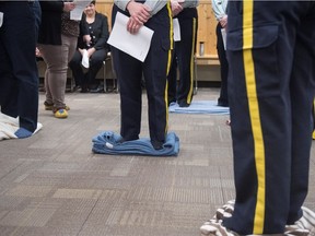 RCMP cadets participate in the Kairos blanket exercise at the Depot Division in Regina, Sask., after the program was adopted this past December.