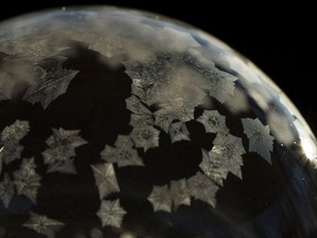 A macro photo of a soap bubble as it begins to freeze at -25 in Edmonton Friday, Dec. 29, 2017.