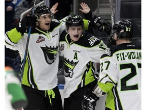 The Edmonton Oil Kings celebrate Davis Koch's (16) game winning goal against the Calgary Hitmen at Rogers Place in Edmonton on Monday, Jan. 1, 2018. (David Bloom)