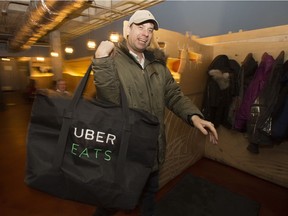 An Uber Eats driver picks up an order from Prairie Noodle Shop, 10350 124 St., in Edmonton Friday, Jan. 5, 2018.